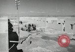 Image of Traffic policeman under umbrella Baghdad Iraq, 1942, second 13 stock footage video 65675022192