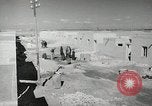 Image of Traffic policeman under umbrella Baghdad Iraq, 1942, second 16 stock footage video 65675022192