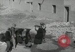 Image of Traffic policeman under umbrella Baghdad Iraq, 1942, second 23 stock footage video 65675022192