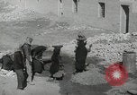 Image of Traffic policeman under umbrella Baghdad Iraq, 1942, second 24 stock footage video 65675022192