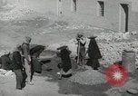 Image of Traffic policeman under umbrella Baghdad Iraq, 1942, second 25 stock footage video 65675022192