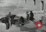 Image of Traffic policeman under umbrella Baghdad Iraq, 1942, second 26 stock footage video 65675022192