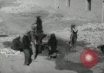 Image of Traffic policeman under umbrella Baghdad Iraq, 1942, second 29 stock footage video 65675022192