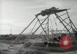 Image of Traffic policeman under umbrella Baghdad Iraq, 1942, second 37 stock footage video 65675022192