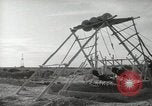 Image of Traffic policeman under umbrella Baghdad Iraq, 1942, second 38 stock footage video 65675022192