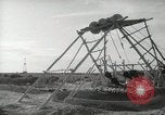 Image of Traffic policeman under umbrella Baghdad Iraq, 1942, second 39 stock footage video 65675022192