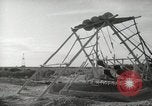 Image of Traffic policeman under umbrella Baghdad Iraq, 1942, second 40 stock footage video 65675022192