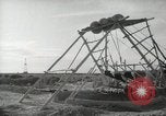 Image of Traffic policeman under umbrella Baghdad Iraq, 1942, second 41 stock footage video 65675022192