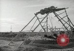Image of Traffic policeman under umbrella Baghdad Iraq, 1942, second 42 stock footage video 65675022192