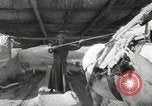 Image of Traffic policeman under umbrella Baghdad Iraq, 1942, second 57 stock footage video 65675022192