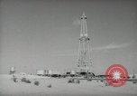 Image of Oil drilling rig Iraq, 1945, second 27 stock footage video 65675022193