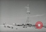 Image of Oil drilling rig Iraq, 1945, second 29 stock footage video 65675022193