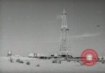 Image of Oil drilling rig Iraq, 1945, second 31 stock footage video 65675022193
