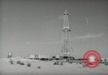 Image of Oil drilling rig Iraq, 1945, second 32 stock footage video 65675022193