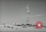 Image of Oil drilling rig Iraq, 1945, second 33 stock footage video 65675022193