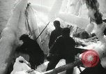 Image of Fishermen de-icing fishing boats Boston Massachusetts USA, 1935, second 11 stock footage video 65675022201