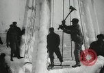 Image of Fishermen de-icing fishing boats Boston Massachusetts USA, 1935, second 20 stock footage video 65675022201