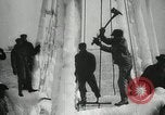 Image of Fishermen de-icing fishing boats Boston Massachusetts USA, 1935, second 21 stock footage video 65675022201