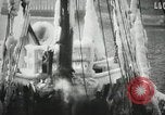 Image of Fishermen de-icing fishing boats Boston Massachusetts USA, 1935, second 22 stock footage video 65675022201