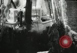 Image of Fishermen de-icing fishing boats Boston Massachusetts USA, 1935, second 23 stock footage video 65675022201