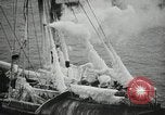 Image of Fishermen de-icing fishing boats Boston Massachusetts USA, 1935, second 26 stock footage video 65675022201