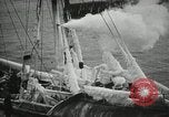Image of Fishermen de-icing fishing boats Boston Massachusetts USA, 1935, second 27 stock footage video 65675022201