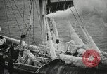 Image of Fishermen de-icing fishing boats Boston Massachusetts USA, 1935, second 28 stock footage video 65675022201