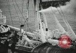 Image of Fishermen de-icing fishing boats Boston Massachusetts USA, 1935, second 29 stock footage video 65675022201