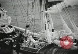 Image of Fishermen de-icing fishing boats Boston Massachusetts USA, 1935, second 30 stock footage video 65675022201