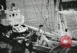 Image of Fishermen de-icing fishing boats Boston Massachusetts USA, 1935, second 32 stock footage video 65675022201