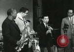 Image of Japanese instrumentalists join the Goodman band Japan, 1957, second 60 stock footage video 65675022215