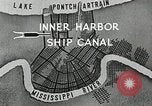Immagine di Nave che entra in porto interno canal New Orleans Louisiana USA, 1929, secondo 9 filmato di repertorio 65675022220