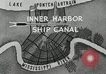 Immagine di Nave che entra in porto interno canal New Orleans Louisiana USA, 1929, secondo 10 filmato di repertorio 65675022220