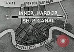 Immagine di Nave che entra in porto interno canal New Orleans Louisiana USA, 1929, secondo 12 filmato di repertorio 65675022220