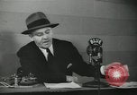 Image of Columnist Walter Winchell makes a radio broadcast New York City USA, 1944, second 29 stock footage video 65675022246