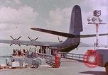 Image of US Aircraft JRM-1 removing casualties and taking off Pearl Harbor Hawaii USA, 1946, second 20 stock footage video 65675022271