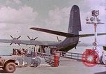 Image of US Aircraft JRM-1 removing casualties and taking off Pearl Harbor Hawaii USA, 1946, second 21 stock footage video 65675022271