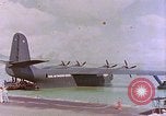 Image of US Aircraft JRM-1 removing casualties and taking off Pearl Harbor Hawaii USA, 1946, second 58 stock footage video 65675022271