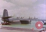 Image of US Aircraft JRM-1 removing casualties and taking off Pearl Harbor Hawaii USA, 1946, second 59 stock footage video 65675022271