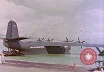 Image of US Aircraft JRM-1 removing casualties and taking off Pearl Harbor Hawaii USA, 1946, second 60 stock footage video 65675022271
