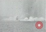 Image of Japanese ships being hit by United States cruisers Japan, 1946, second 3 stock footage video 65675022273