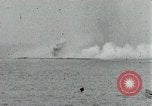 Image of Japanese ships being hit by United States cruisers Japan, 1946, second 4 stock footage video 65675022273