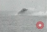 Image of Japanese ships being hit by United States cruisers Japan, 1946, second 9 stock footage video 65675022273