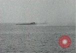 Image of Japanese ships being hit by United States cruisers Japan, 1946, second 10 stock footage video 65675022273
