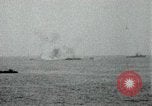 Image of Japanese ships being hit by United States cruisers Japan, 1946, second 14 stock footage video 65675022273