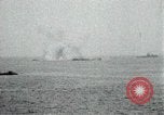 Image of Japanese ships being hit by United States cruisers Japan, 1946, second 15 stock footage video 65675022273