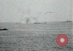 Image of Japanese ships being hit by United States cruisers Japan, 1946, second 16 stock footage video 65675022273