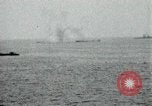 Image of Japanese ships being hit by United States cruisers Japan, 1946, second 17 stock footage video 65675022273