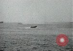 Image of Japanese ships being hit by United States cruisers Japan, 1946, second 18 stock footage video 65675022273