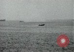 Image of Japanese ships being hit by United States cruisers Japan, 1946, second 20 stock footage video 65675022273